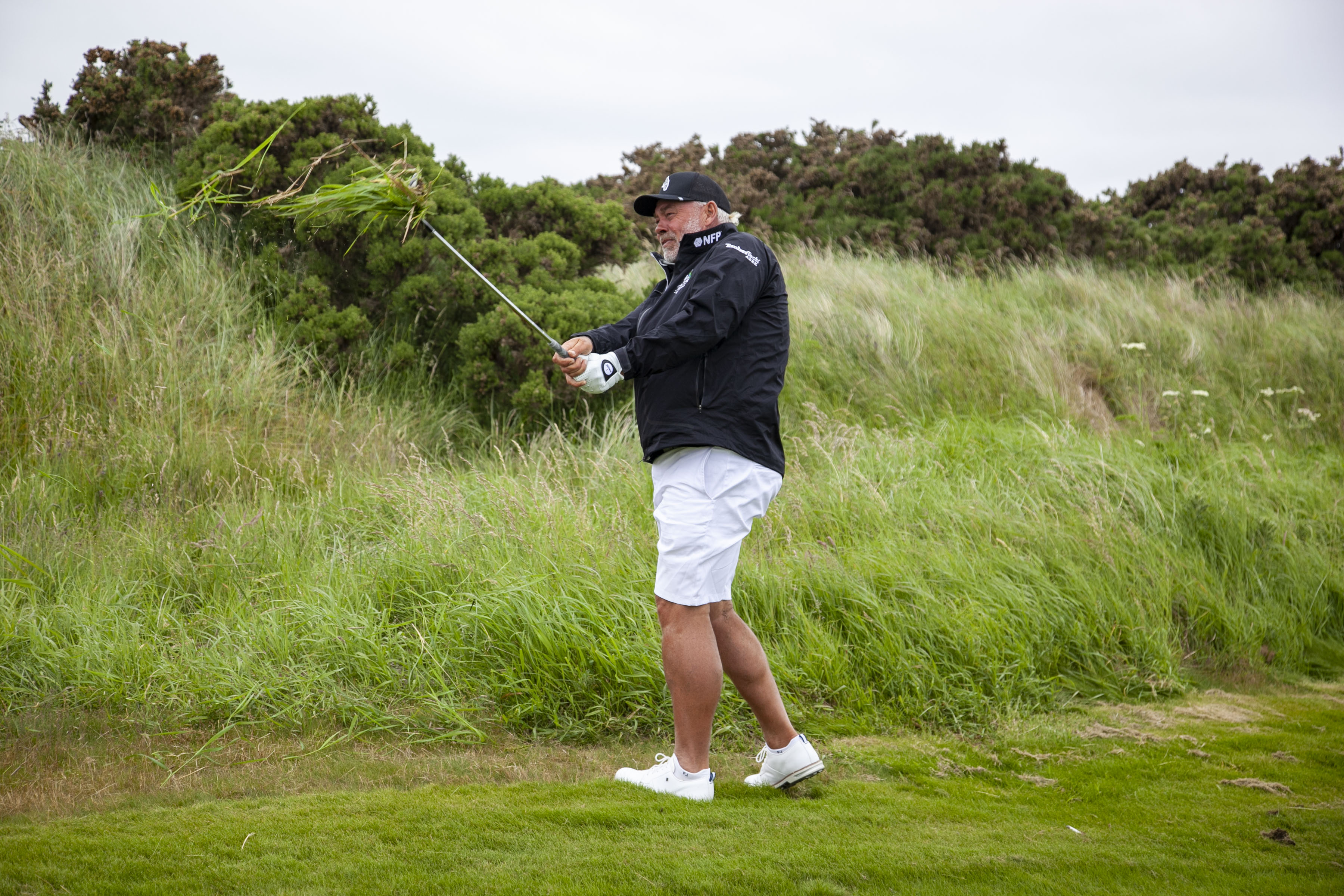 Darren Clarke playing golf