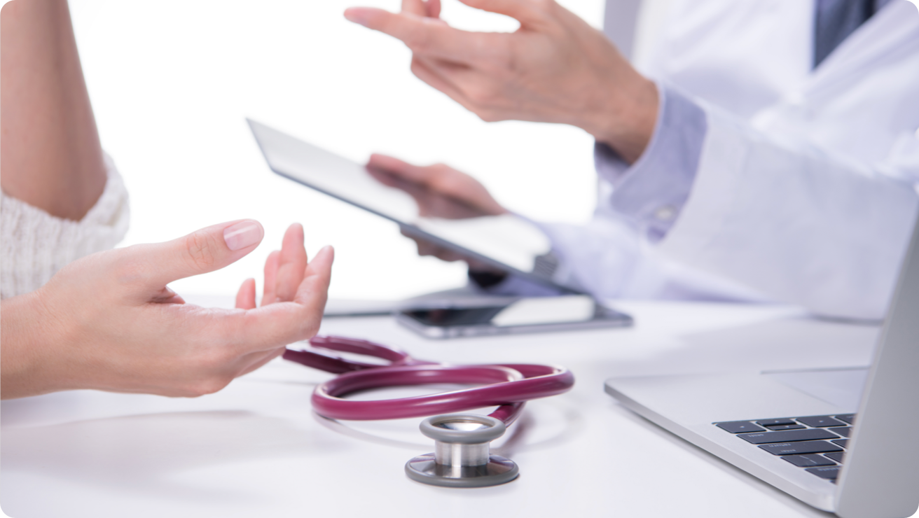A doctor talking with a patient.