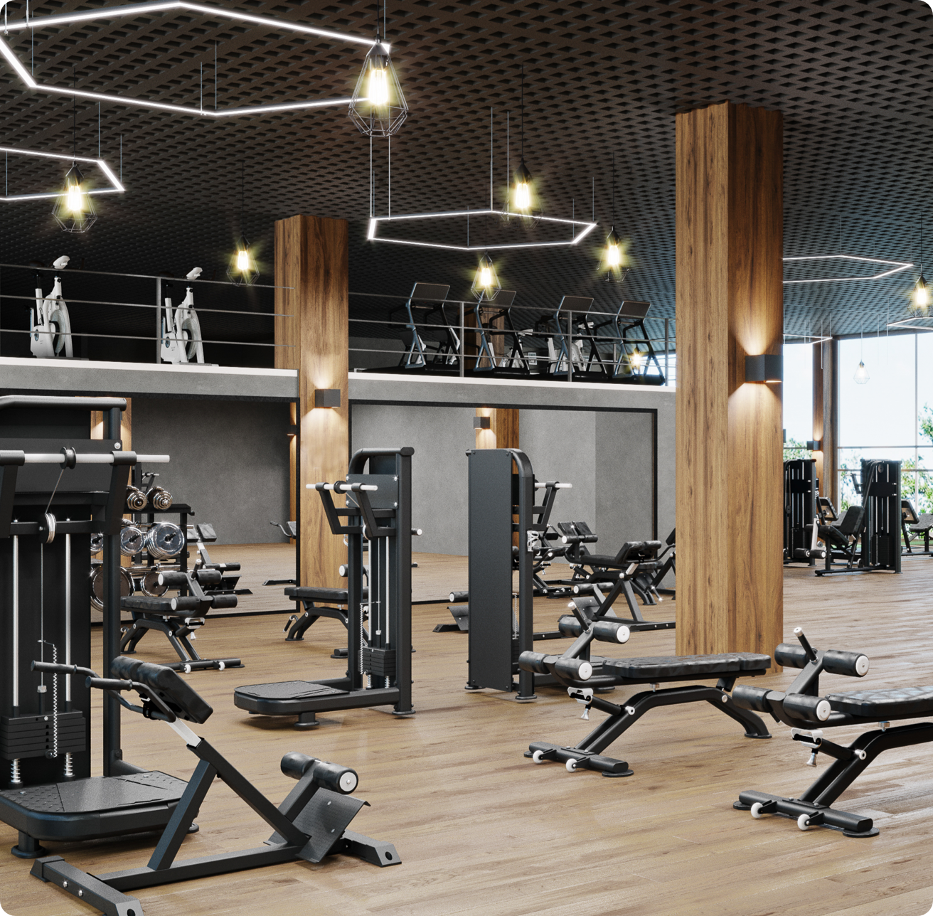 Well-lit fitness gym with various workout equipment.